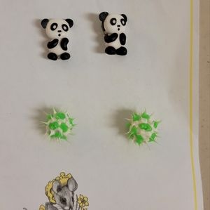Girl's panda and spike rubber ball earrings.